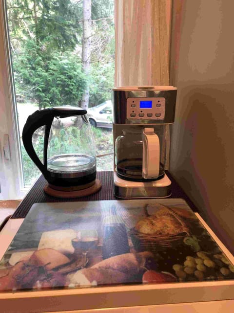 Kettle and and coffee-maker in a kitchenette
