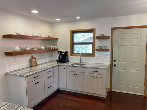 Breakfast Bar area with second sink, coffee maker, and blender