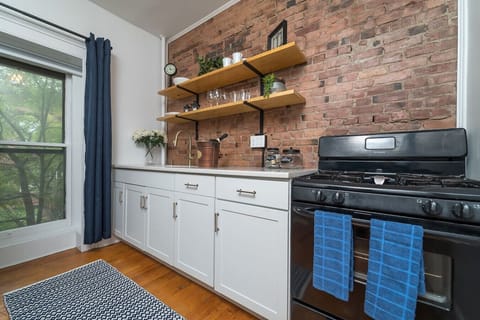 This is an original brick wall in the kitchen that was refinished.