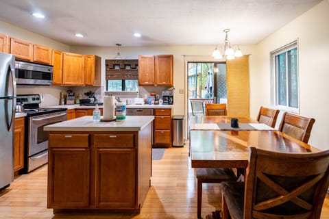Kitchen and Dining area, leading to the outside deck.