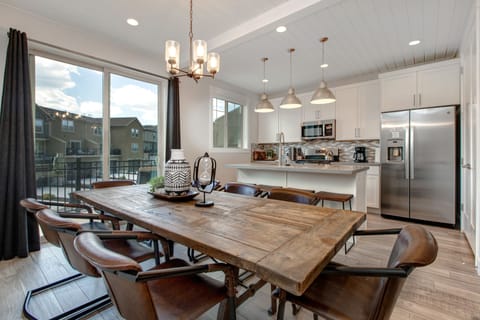 Dining Area with Seating for Eight and Balcony Access