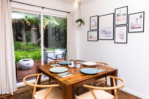 Enjoy dining with a beautiful redwood forest view! Dining room table can seat 8.