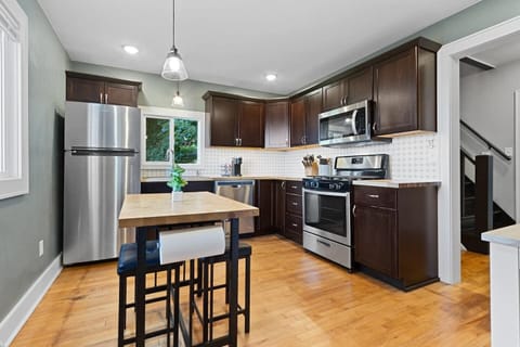 Spacious living area is great for groups, with the main level featuring an open concept living room, kitchen and formal dining room