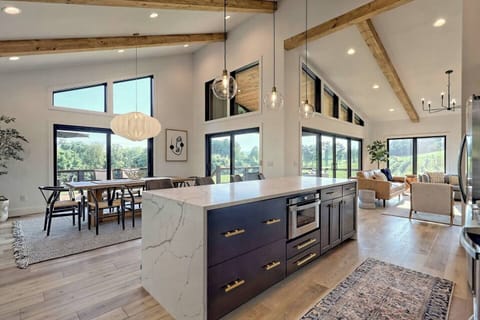 Kitchen area with lg island and dining area with seating for 8