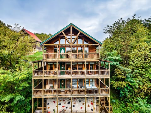 Three stories of cozy cabin charm—plenty of space, privacy, and Smoky Mountain style.