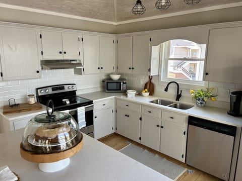 Kitchen with new Quartz Countertops, Stainless Steel Appliances, Dine At Island