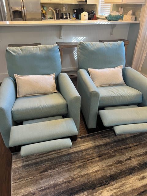 Two comfy recliners in living room 