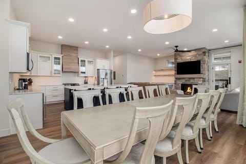 2nd floor dining room table and 12 chairs.