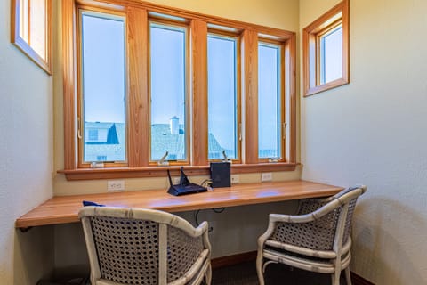 The Top-Level Desk Area is perfect for catching up on emails or working remotely by the sea!