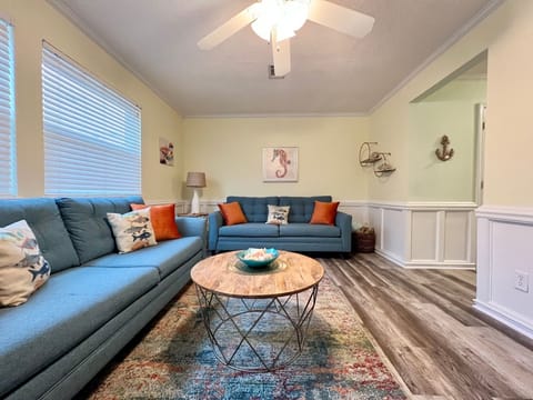 The living room features brand new furniture installed in January, 2023.