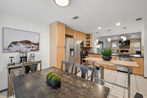 Delight in meal times at our serene and tidy dining area, showcasing perfect minimalistic charm for your dining pleasure.