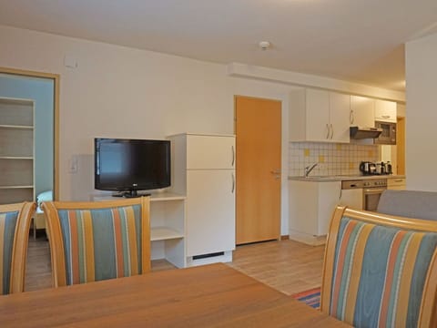 Furniture, Table, Cabinetry, Home Appliance, Wood, Living Room, Interior Design, Building, Flooring, Shelving