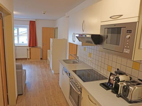 Cabinetry, Countertop, Sink, Kitchen Sink, Kitchen Appliance, Gas Stove, Building, Kitchen Stove, Tap, Kitchen