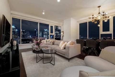 Living room with a comfortable sofa and TV. 