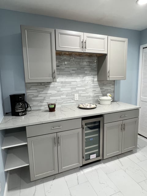 Butler’s Pantry with Keurig coffee maker & wine cooler. 
