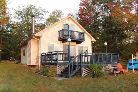 Lakefront side of the house - deck and king bedroom balcony. 