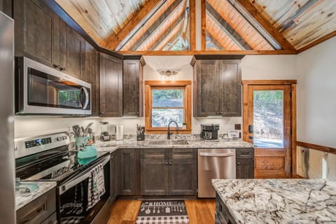 Modern kitchen with the best appliances and cookware