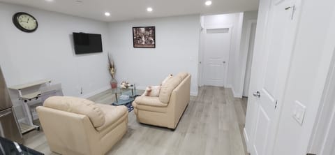 Living room space with dimmer lights for movies and a moveable workstation
