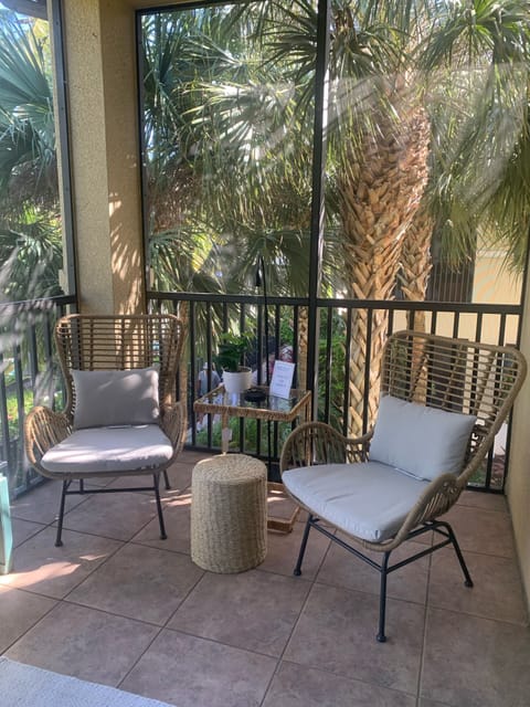 Oversized Lanai has Dining Table & 4 Chairs plus bench. 2 Reading Chairs.