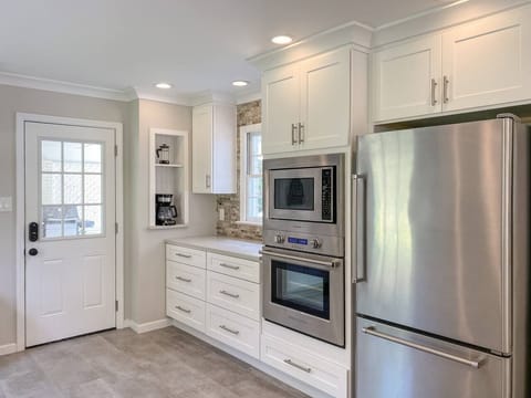 Another view of the kitchen with plenty of storage.