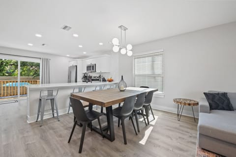 With an additional seating for 4 at counter and a folding high chair stored in closet. 