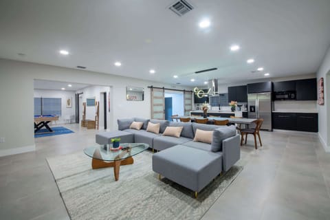 Spacious living area perfect for gathering, relaxing, and creating memories together in a stylish and comfortable setting.