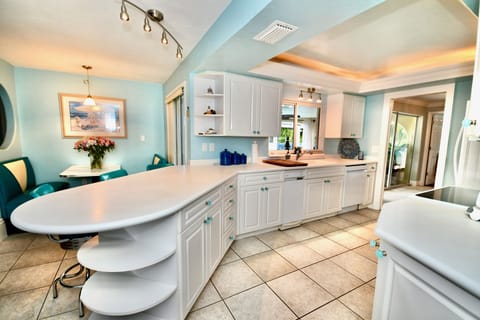 Large open kitchen with all amenities, kitchenware, paper goods, cleaning items!