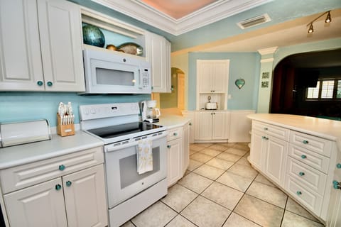 Fully stocked w/ dishes, cookware, glassware, silverware, utensils, spices, etc