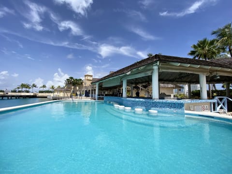 The pool at Port St. Charles with a bar