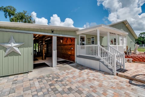 2 row horse stall barn with stalls tack room and feed room on both sides