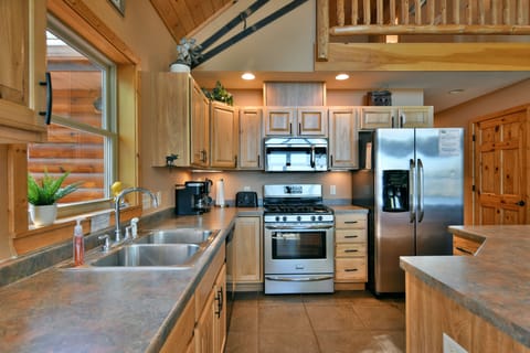 The chef in your family will love cooking meals in this bright kitchen with lake views