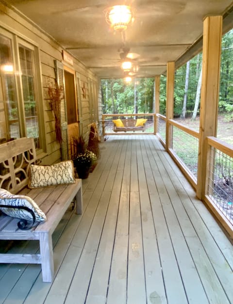 Perfect front porch to watch all the wildlife while enjoying your morning coffee