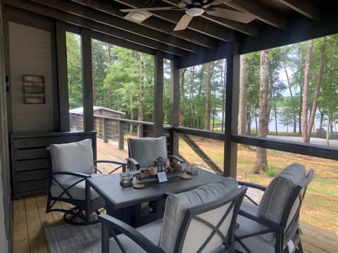 Fire Pit Chat table on covered veranda with lake views! 