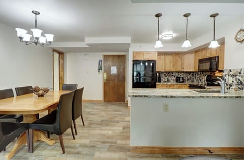 A modern open-plan kitchen and dining area.