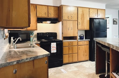 Full size stove/oven and refrigerator