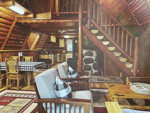 Enjoy your company in the open kitchen, dining, living and work space.