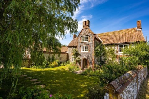 School House, Burnham Thorpe: A large detached, characterful flint and brick rural retreat with outdoor pool