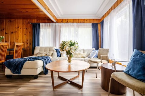 Living Room 1 (Main Floor): Sun-filled living space designed for comfort, style, and effortless relaxation