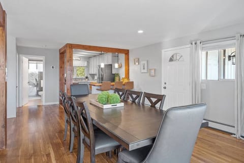 Dinning area on the first floor with lake views and a good size dining table that can easily fit 8 people.