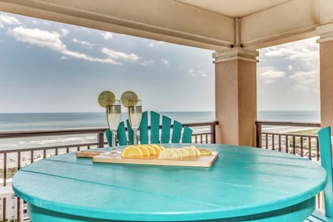 Sip champagne and savor ocean breezes from your private beachfront balcony, where turquoise waters stretch endlessly before you.