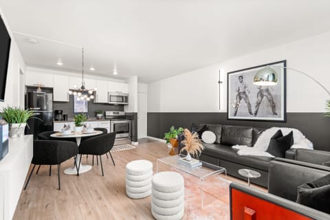 open living area with a kitchen and dining table