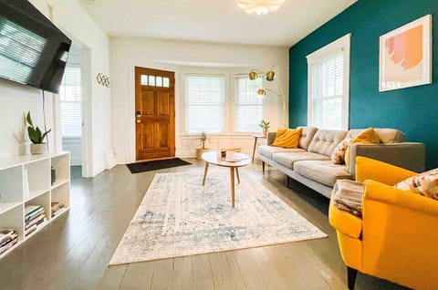 Welcome to your mid-century modern retreat! Relax in a cozy, stylish space featuring a comfy leather sofa, Classic accent chairs and retro-inspired decor. Enjoy the natural light, unwind and feel right at home!