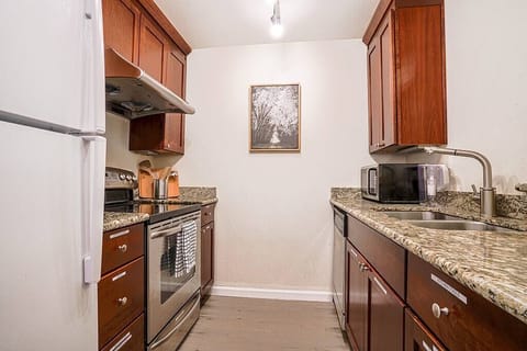 The fully upgraded kitchen comes stocked with everything you need to cook meals during your stay.