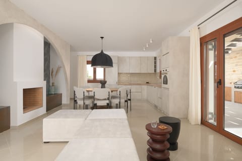 The living room & dining area opens to the terrace.