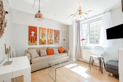Living Room with extendable/retractable dining table with 4 chairs. 