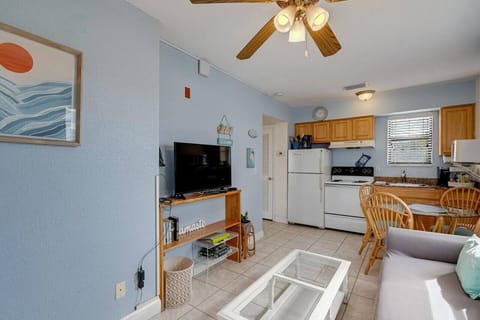 Open living space flowing into the kitchen and dining area for easy, comfortable living.
