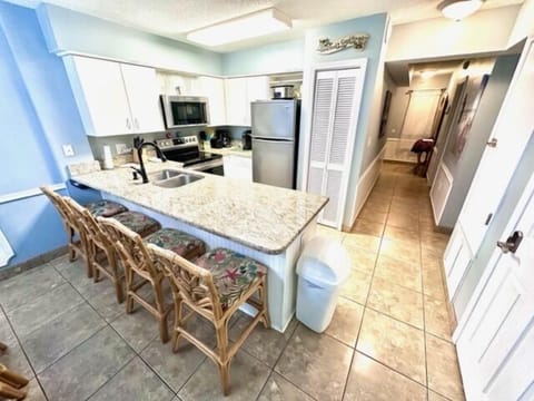Kitchen has SS appliances, including dishwasher!