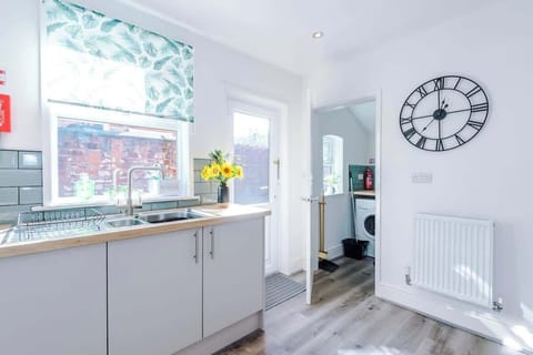 The spacious kitchen has everything you need for a short or long stay away whilst in Crewe.