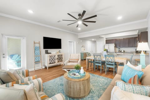 Living Room- 
Queen Sleeper Sofa 
Smart TV 
Ground Floor Patio Access