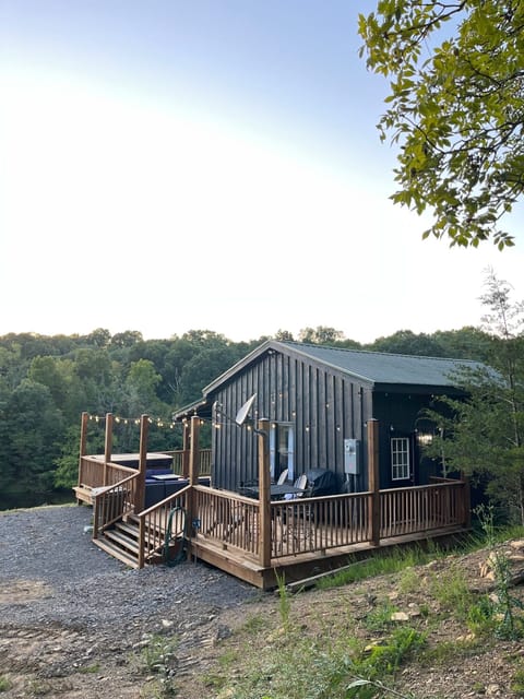 Outdoor dining table, sectional, propane fire pit, and hot tub